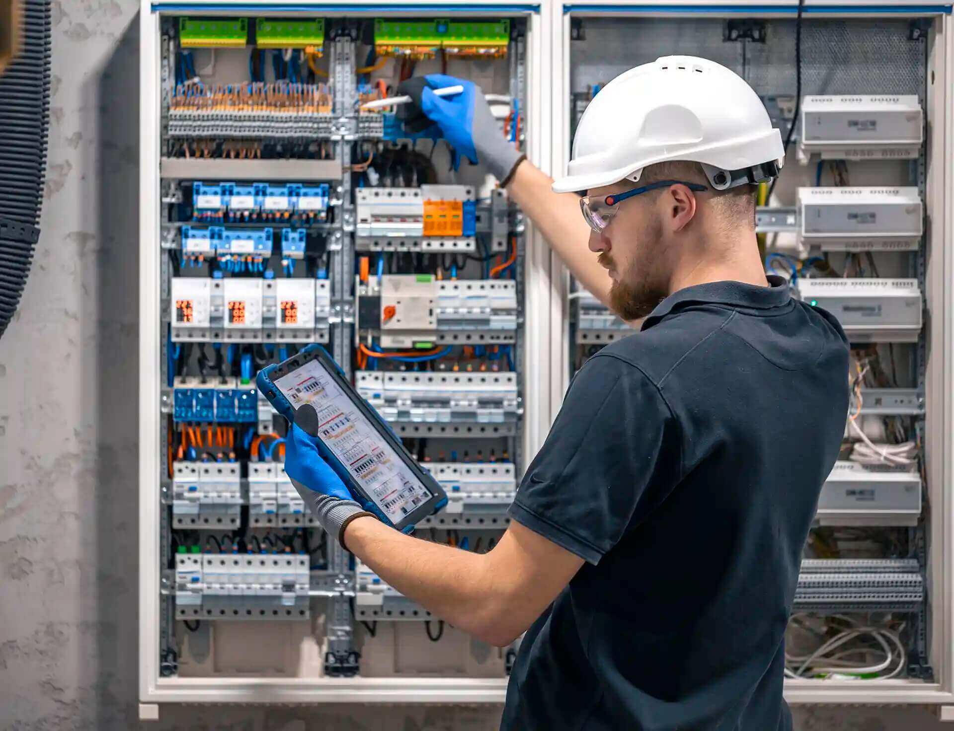 Schaffhouser electrician testing an industrial electrical panel